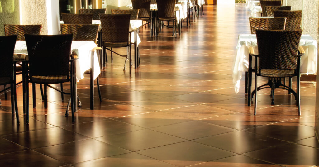 empty restaurant with clear walkways to prevent slips, trips, and falls