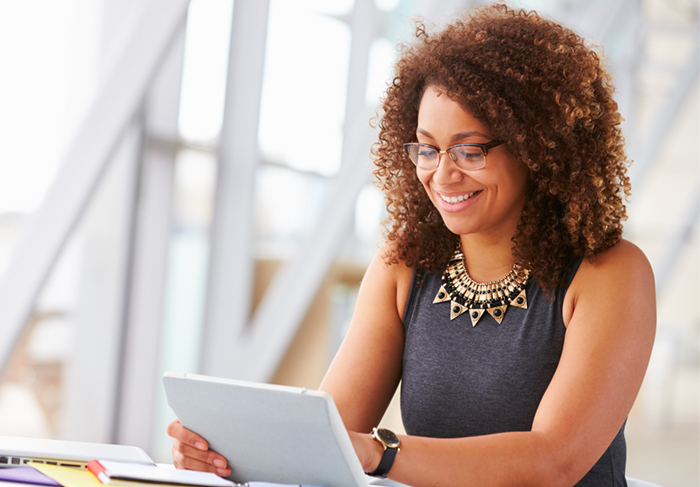 Woman working on tablet