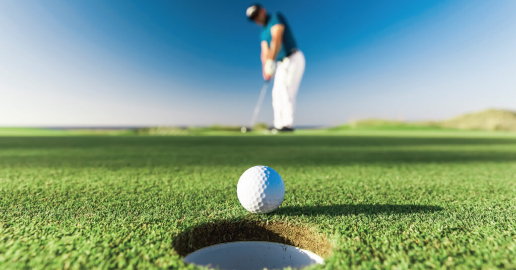 Golfer playing on golf course