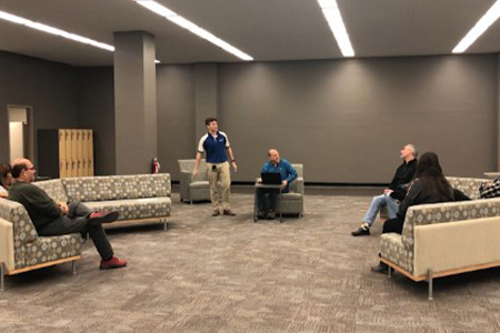 Merchants employees sitting in foyer