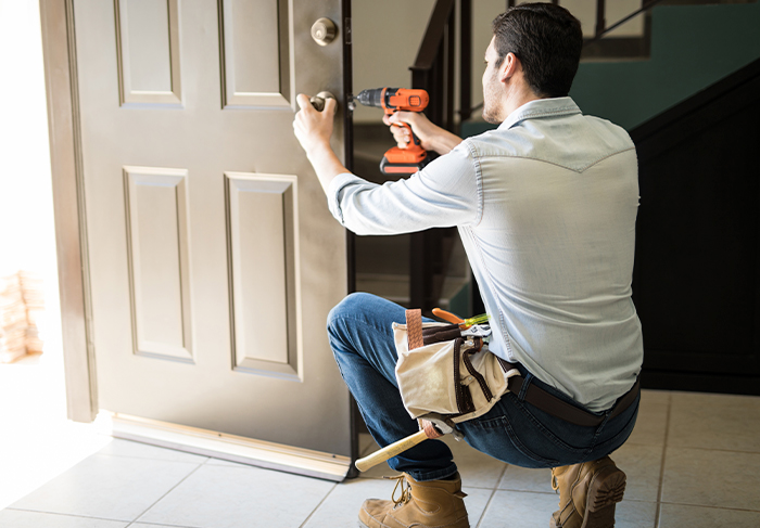 Handyman fixing door