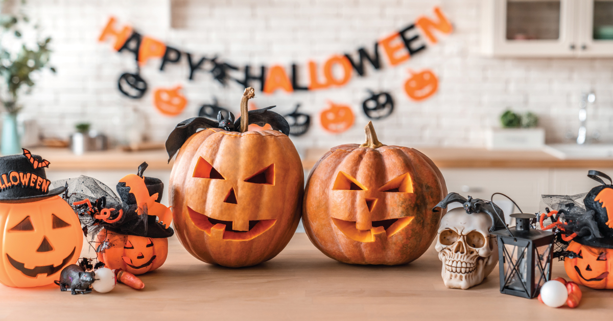 pumpkins on a table, safe decorating for halloween, decorating safety tips including fire safety