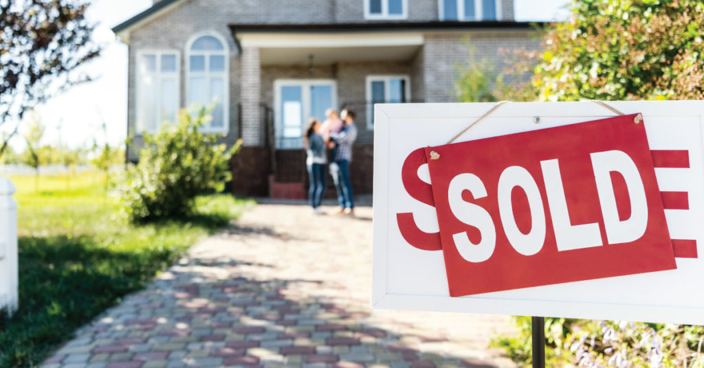 photo of family preparing to sell home