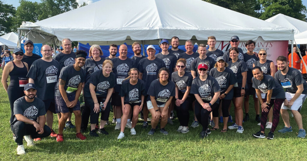 Merchants Insurance Group colleagues pose before the Corporate Challenge in Buffalo, NY