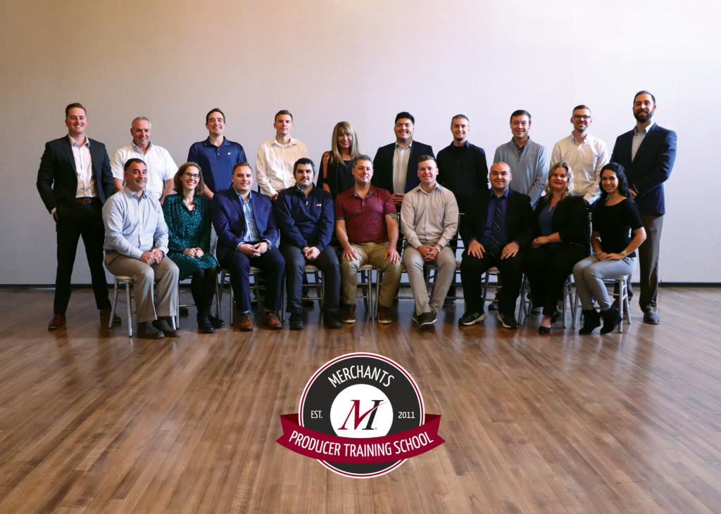 Producer Training School group photo with Merchants' PTS logo