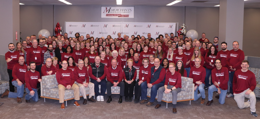 group photo of colleagues at Merchants' 105th anniversary celebration