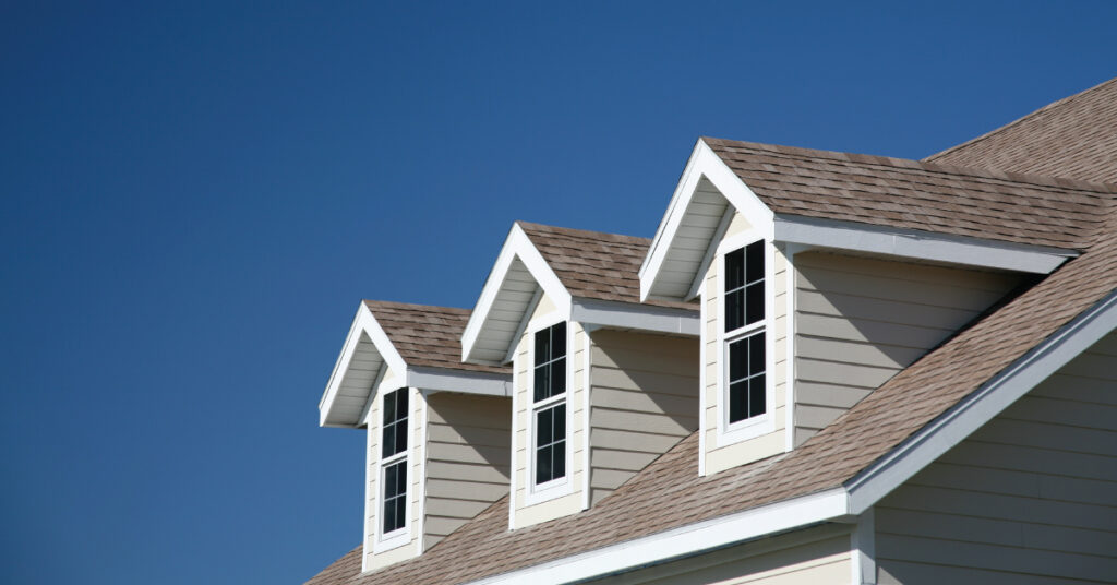 photo of roof of a home on a sunny, spring day