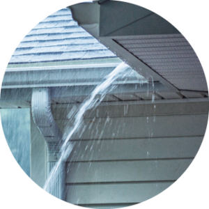 gutter in downpour protecting your property from hurricane