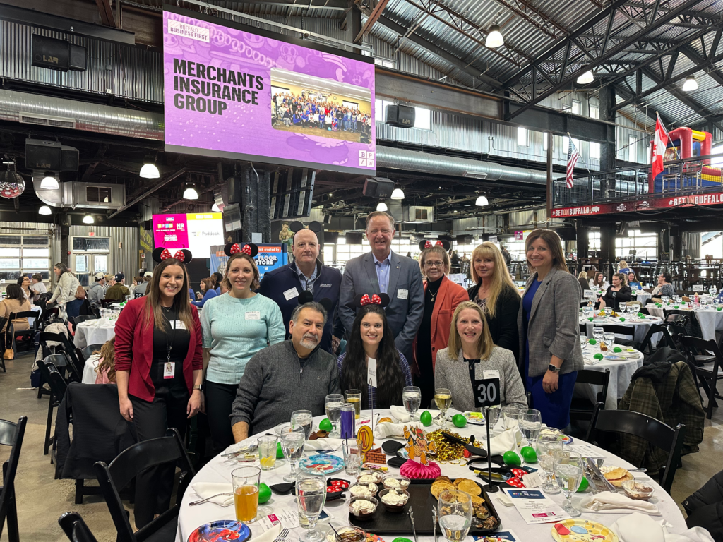 Group photo of Merchants colleagues and leadership at Buffalo Business First's annual Best Places to Work event