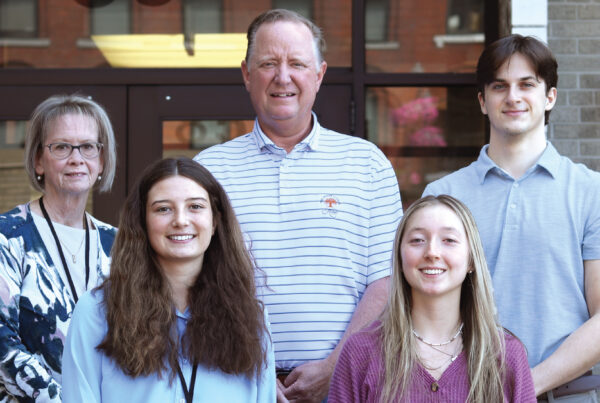 Group photo of Merchants Insurance Group's 2025 Summer Interns with Charles Makey and Kelly Julius