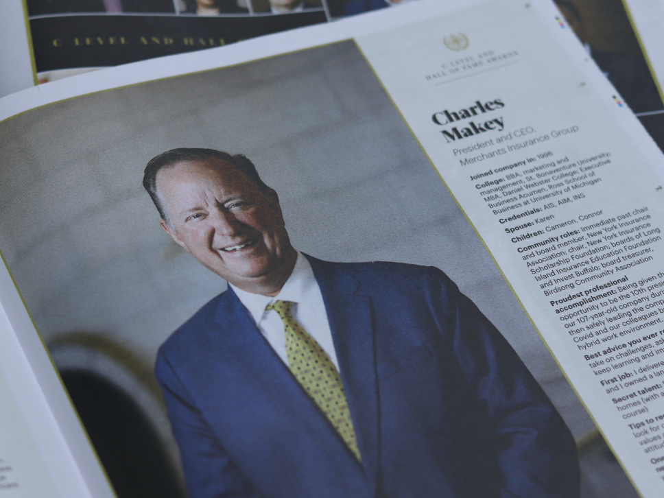 Photo of newspaper featuring Buffalo Business First article about Charles Makey, C-Level Award recipient