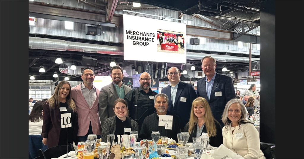 Group photo of Merchants colleagues at Best Places to Work & HR Impact Awards event, 2026