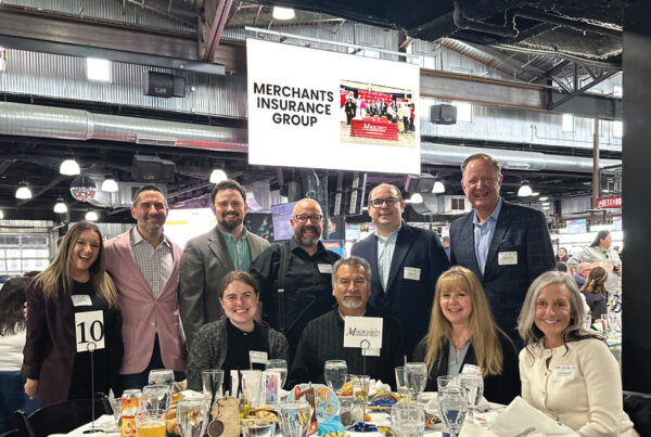 Group photo of Merchants colleagues at Best Places to Work & HR Impact Awards event, 2026