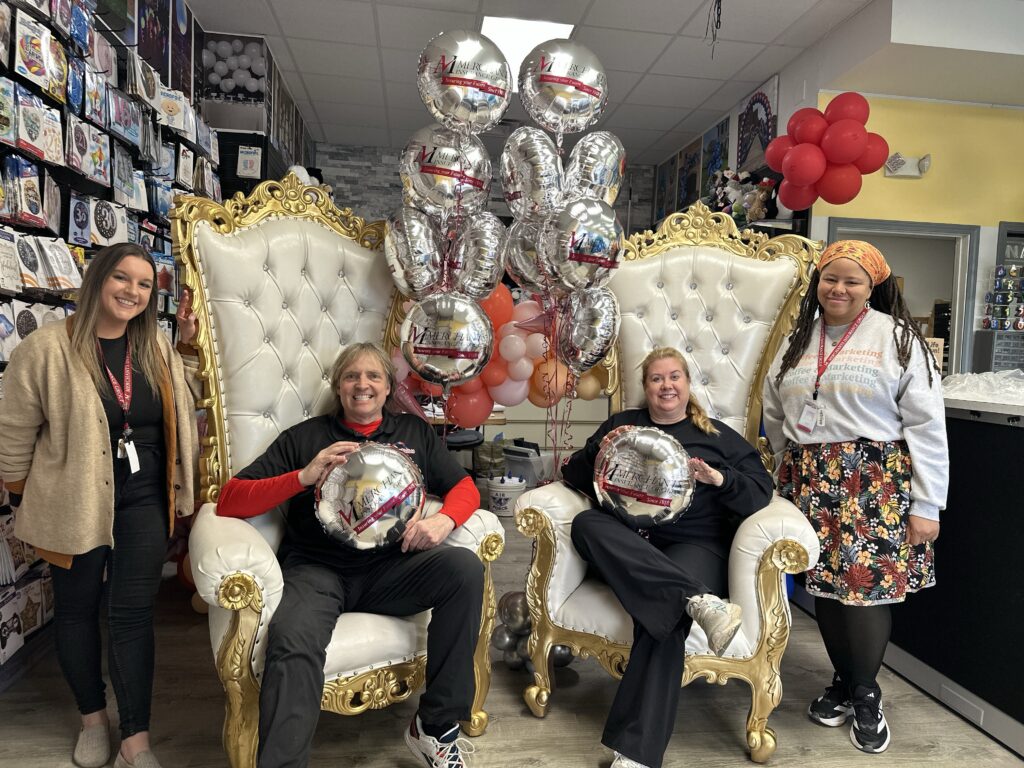 Merchants Insurance Group colleagues Erica Kellogg and Kyra-Jade Bogdan with Balloon Masters co-owners Chris and Marlene Potts
