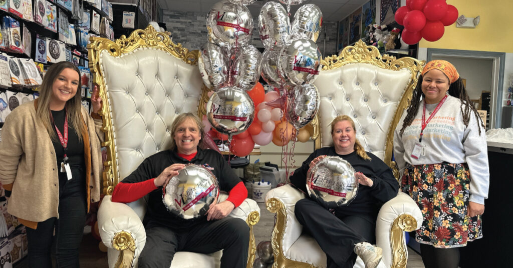 Merchants Insurance Group colleagues Erica Kellogg and Kyra-Jade Bogdan with Balloon Masters co-owners Chris and Marlene Potts