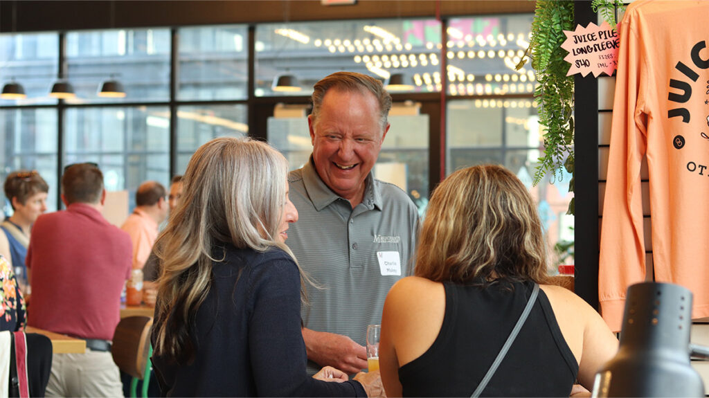 Merchants colleagues chatting at the 2026 Colleague Social
